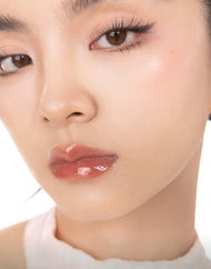 GIRLCULT Unreal Lip Gloss: Peach Festival