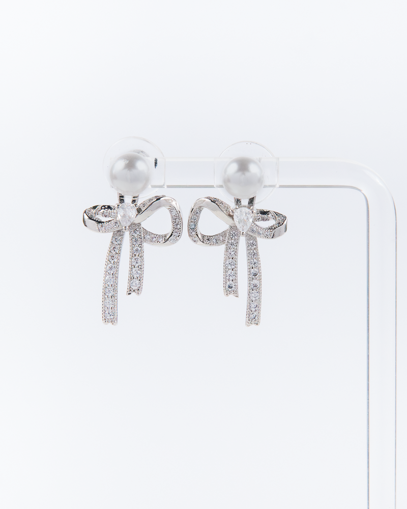 Boucles d'oreilles pendantes en forme de nœud en perles de NYU