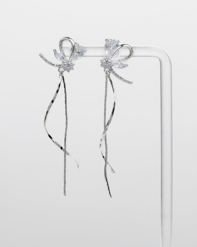 SUKOSHI Crystal Bow Twisted Ribbon Drop Earrings