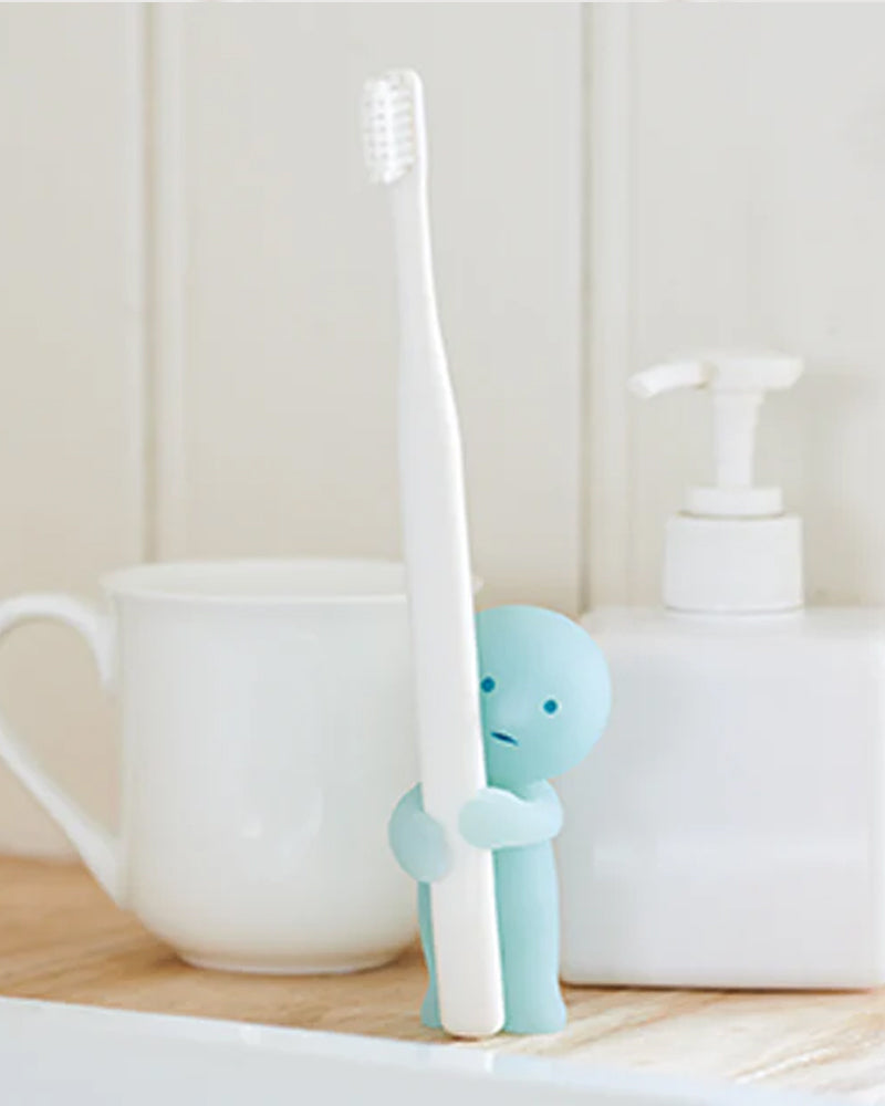 Smiski® Toothbrush Stand: Holding