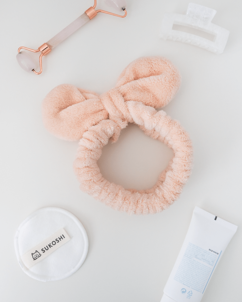 Bandeau en peluche douce avec nœud