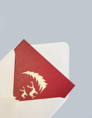 Wintry Reindeer 3D Pop-Up Card inside of open envelope