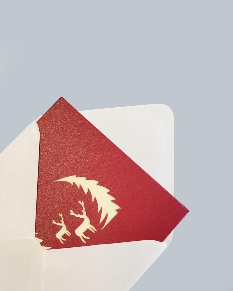 Wintry Reindeer 3D Pop-Up Card inside of open envelope