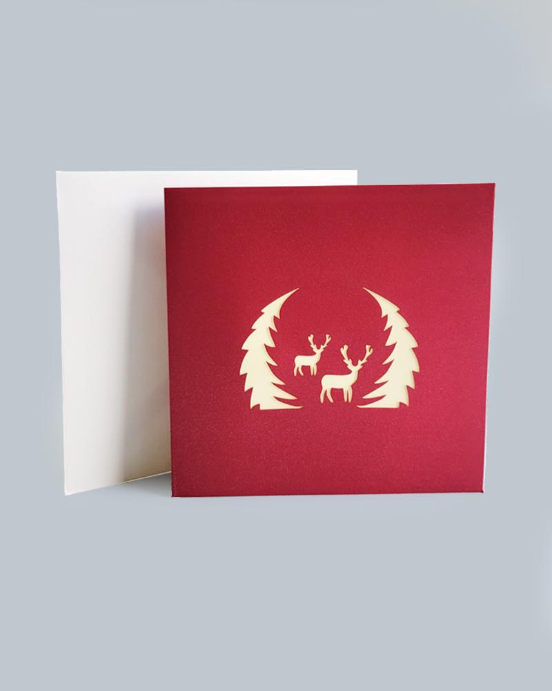 Wintry Reindeer 3D Pop-Up Card against white envelope