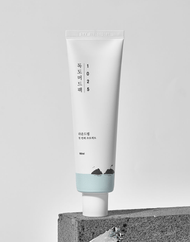 ROUND LAB 1025 Dokdo Mud Mask standing on brick